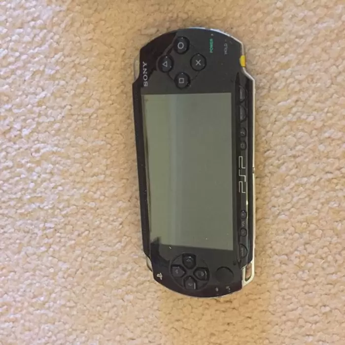 NZ$100 Sony PSP 10/10 condition comes with 2 games